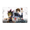 Transform your dueling experience with our exclusive art 25th Anniversary Tin: Dueling Mirrors playmat from LDB Duel! Featuring a soft cloth top for smooth card movement and a durable rubber back for a secure grip, this 24x14 inch mat is machine washable and safe for cards and sleeves. Yugi-Kaiba-yugioh-mtg-pokemon-custom-artwork-premium-durable-rubber-ldb-duel